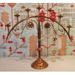 CANDLESTAND, brass, of Gothic influence with seven sconces, 66cm H x 74cm W overall.