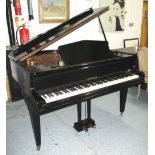 BABY GRAND PIANO, Challen gilded iron framed in an ebonised case, recently restored and tuned,