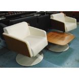 SWIVEL CHAIRS, a pair, cream leather by Krueger International range 'Lyra' and low table to match,