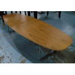 LOW TABLE, by Krueger International range 'Lyra' the oval wooden top on tubular metal base,