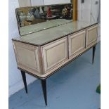 1960'S DRESSING TABLE, with mirrored back and glass top in cream finish on tapered supports,