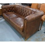 CHESTERFIELD SOFA, antiqued brown leather by Tusting made in England, 90cm D x 84cm x 186cm W.