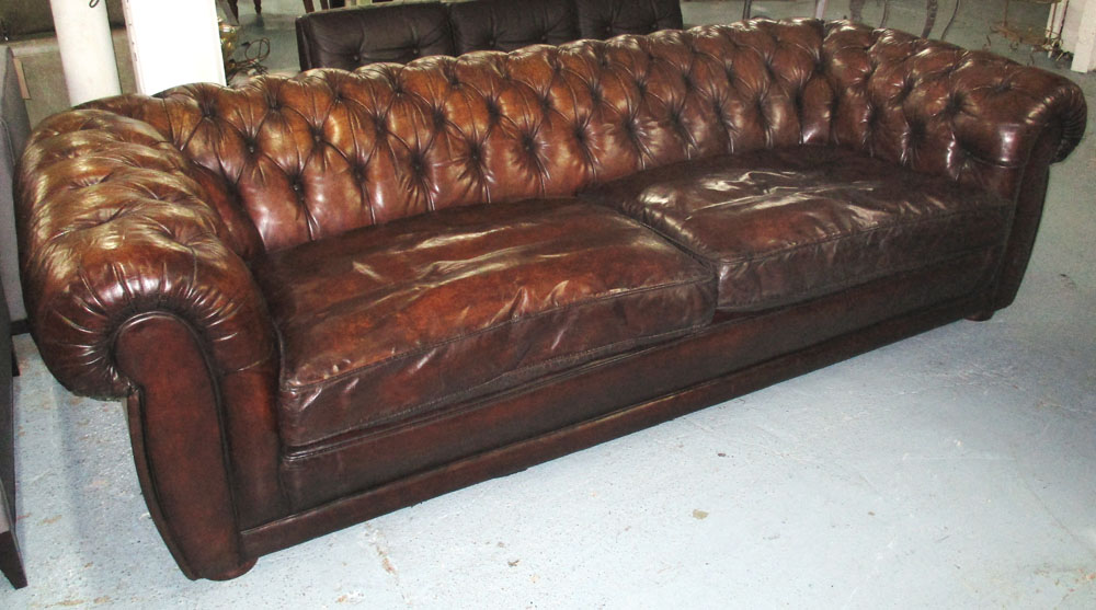 CHESTERFIELD SOFA, vintage, of large proportions,