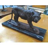 TIGER FIGURE, in bronzed metal on a marble base, 51cm L.