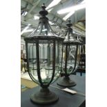 STORM LANTERNS, a pair, with internal night light holders, 74cm H.