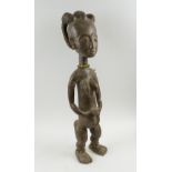 FERTILITY FIGURE, West African carved wooden study of a woman with beaded necklace and anklets,