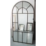 ARCHITECTURAL MIRROR, with domed top in a rustic effect frame, 206cm x 109cm.