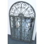GATED MIRROR, in a verdigris finish suitable for inside and out with decorative fretwork,