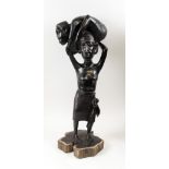 MAKONDE FIGURE SCULPTURE, man carrying another on over his head, Tanzania, carved ebonywood, 65cm H.