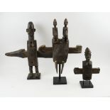 BAMANA DOOR LOCKS, three various carved wood of figurative form,