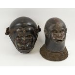 WEST AFRICAN TERRACOTTA MASKS, monkey facemask, 30cm H; and a gorilla headmask, 32cm H.