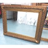 WALL MIRROR, gilt frame with a bevelled plate, 137cm W x 114cm H.