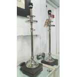 TABLE LAMPS, a pair, in chromed metal finish on stands adjustable heights, 67cm H.