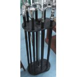 STICK STAND, in ebonised wood with eight canes, 97cm H.