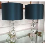 PORTA ROMANA LAMPS, a pair, having three stacked facetted glass balls with satin blue silk shades,