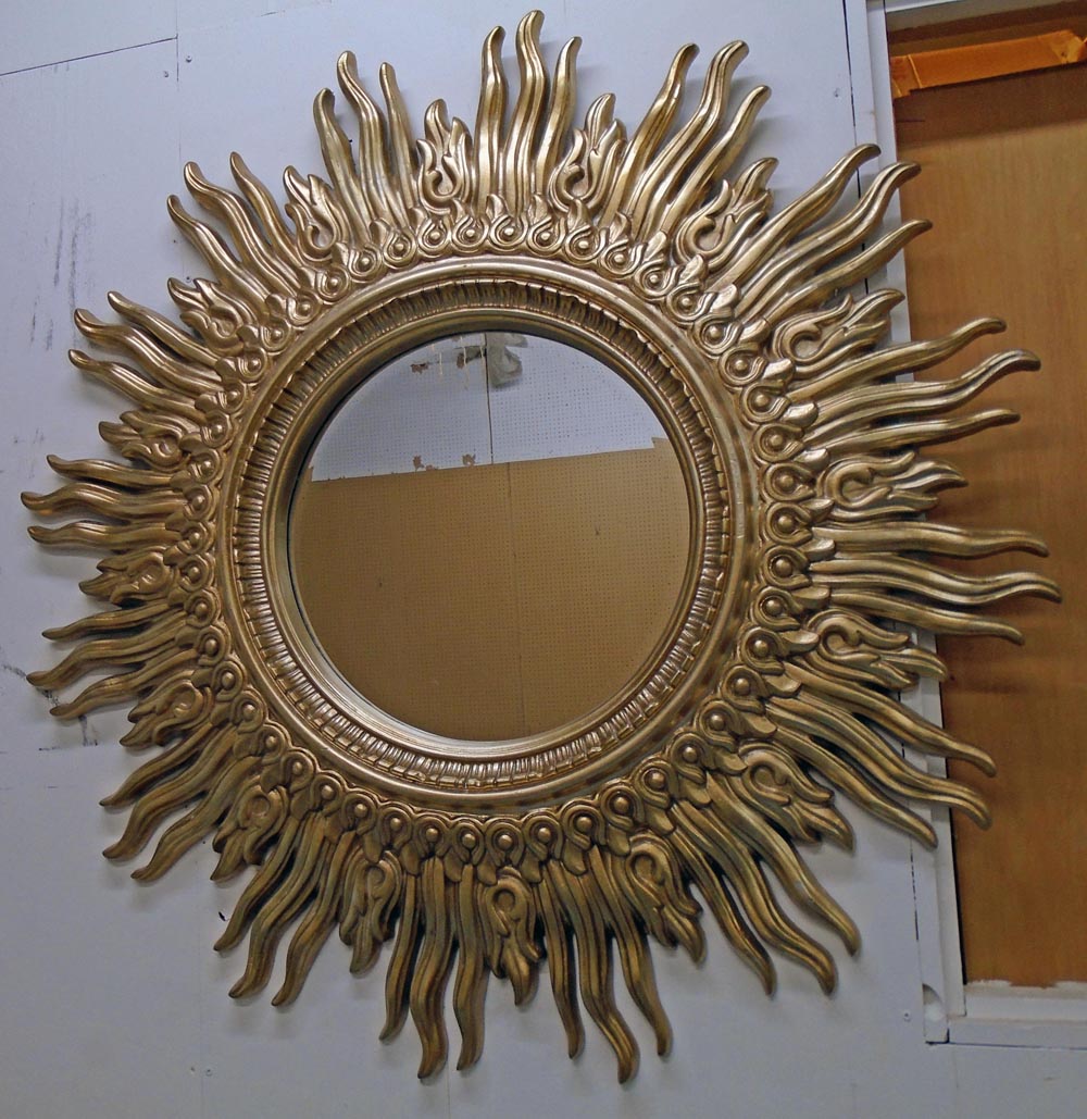 SUNBURST MIRROR, gilt composition with central circular mirror plate and sunburst.