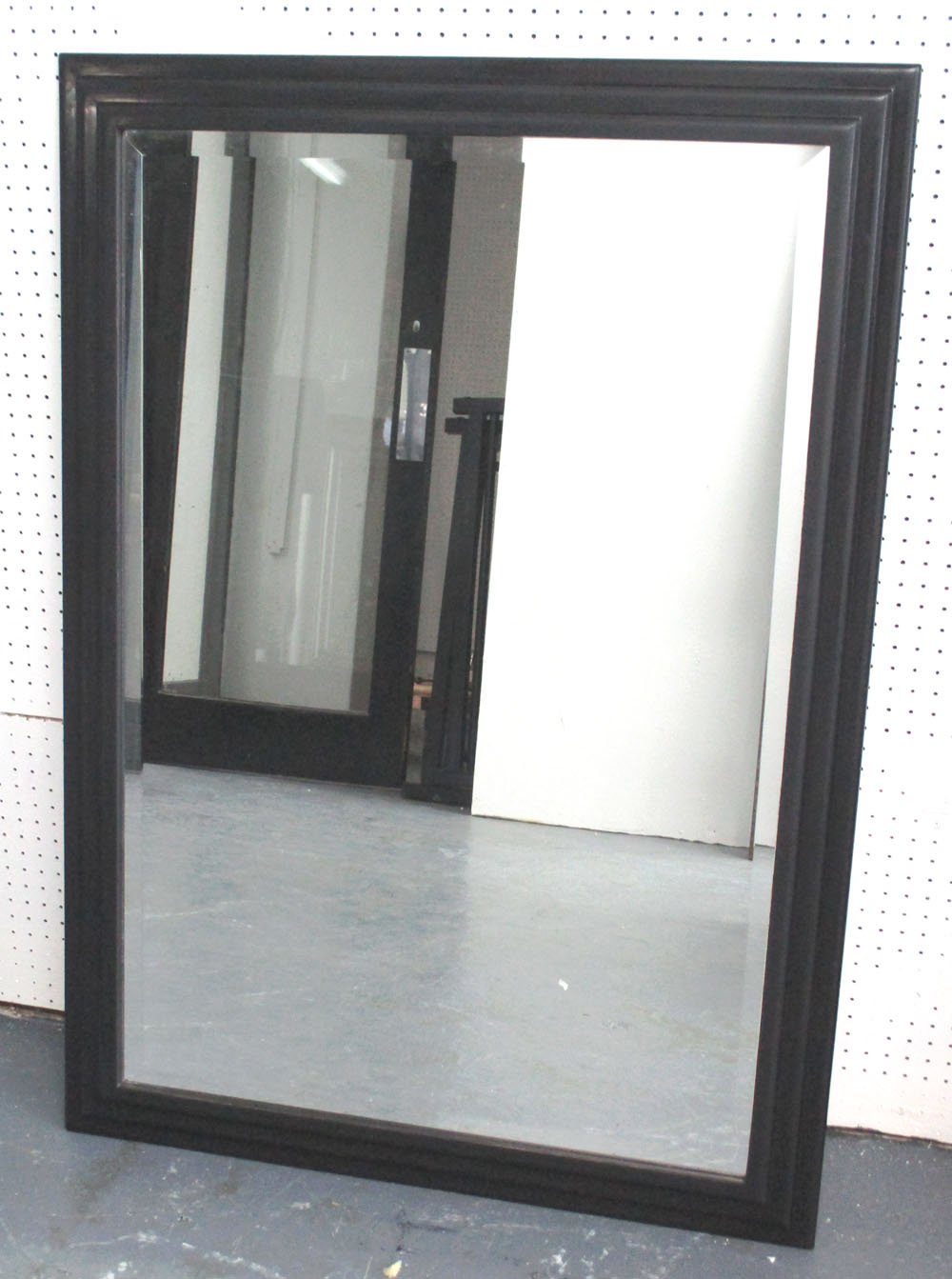WALL MIRROR, with rectangular black moulded frame, 100cm x 72cm.