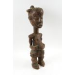 FERTILITY FIGURE, West African, carved wooden study of a woman, 54cm H.