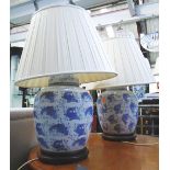 LAMPS, a pair, blue and white Chinese style with shades, each 70cm H overall.