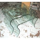 NEST OF TABLES, two, moulded glass (minor chip to smallest) largest 43cm H x 65cm x 50cm.