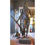 AMERICAN INDIAN BRAVE BRONZE SCULPTURE, with rifle and knife, plinth base, 177cm H maximum.