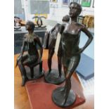 SEATED FEMALE, in bronzed metal finish,