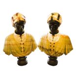 GRAND TOUR STYLE BUSTS, a pair, specimen marble and onyx modelled as blackamoors, 92cm H x 68cm W.