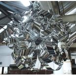 CHANDELIER, of large proportions, abstract, chrome ribbon effect, 100cm H.