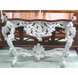 CONSOLE TABLE, Rococo influence with serpentine parquetry top, grey painted and gilt rubbed base,