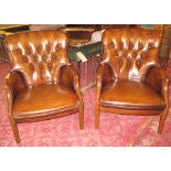 ARMCHAIRS, a pair, vintage faded tan brown buttoned leather each with cushion by Parker Knoll.
