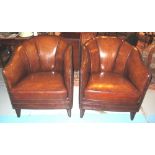 TUB ARMCHAIRS, a pair, studded tan brown leather each with rounded shaped backs.