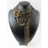 ERICKSON BEAMON CHAIN CHOKER NECKLET of seven interwoven chains entwined with clear rhinestones.