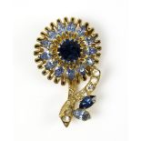 AUSTRIA FOLIATE BROOCH encrusted with aquamarine, sea blue and clear rhinestones, signed Austria. L.