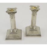 SILVER TABLE CANDLESTICKS, a pair, of classical column form, London 1916,