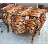 BOMBE COMMODE, in faux tiger skin, with two drawers below, on sabre supports, 123cm x 58cm x 87cm H.