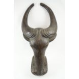 COW MASK, Cameroon, carved wood, 91cm H, on display stand.