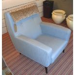 ARMCHAIR, by Rubelli Casa, model 'Colombina', ex-display, in blue, original price £3500,