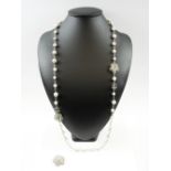 CHANEL CC PEARL NECKLACE AND CAMELLIA BROOCH faux pearls adorned with Swarovski crystals,