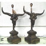 TABLE LAMPS, a pair, in the form of buffalo head skulls, 75cm H.