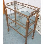 ETAGERE, with three glass shelves, in a gilded metal frame, 74cm x 31cm x 88cm H.