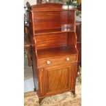 WATERFALL BOOKCASE, Regency mahogany with open shelves above a drawer and a panel door,