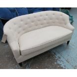 SOFA, of curved form, buttoned back, in neutral fabric, 143cm x 76cm H x 142cm.