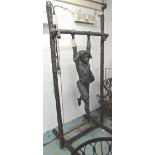 BRONZE, boy swinging from a branch, 250cm H.