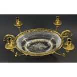 CENTREPIECE BOWL, 20th century cut glass of oval form with decorative gilt metal mounts,