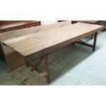 TRESTLE FOLDING TABLE, rectangular planked pine on a locking foldout trestle support,