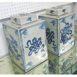 LIDDED JARS, a pair, of square form, Chinese style blue and white, 28cm H.