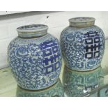 LIDDED GINGER JARS, a pair, in Chinese blue and white, 23cm H.