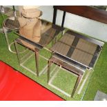 OCCASIONAL TABLES, a set of four, steel, of various shapes and two others.