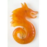 BAKELITE orange bakelite seahorse, L.