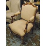 FAUTEUIL, circa 1900, French, with carved showframe with gilt detail and upholstered in calico,
